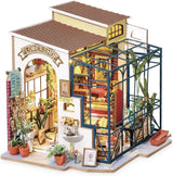 Robotime DG145 Rolife Emily's Flower Shop Casa de Muñecas en Miniatura Fabricada en madera, metal, tela y cartón, Dimensiones: 22 X 15 X 17 Cm, Naty Shop casas de muñecas