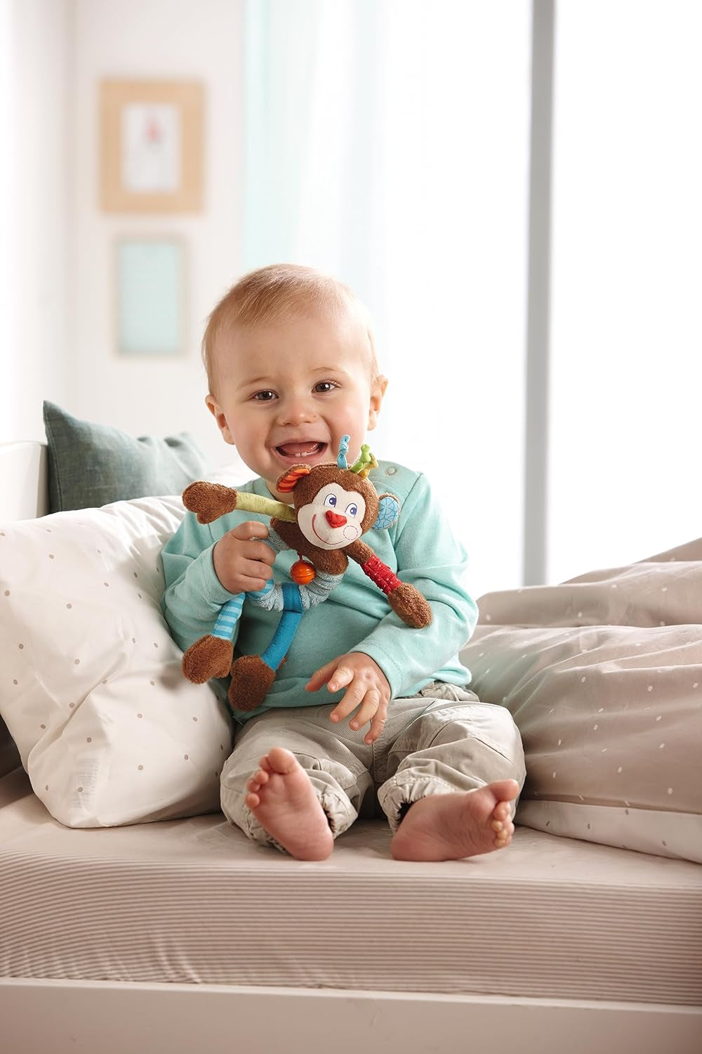 HABA 302999 - Mono Lino, peluche con muchos efectos para jugar y descubrir, juguete para niños a partir de 6 meses Juguetes Bebe Naty Shop