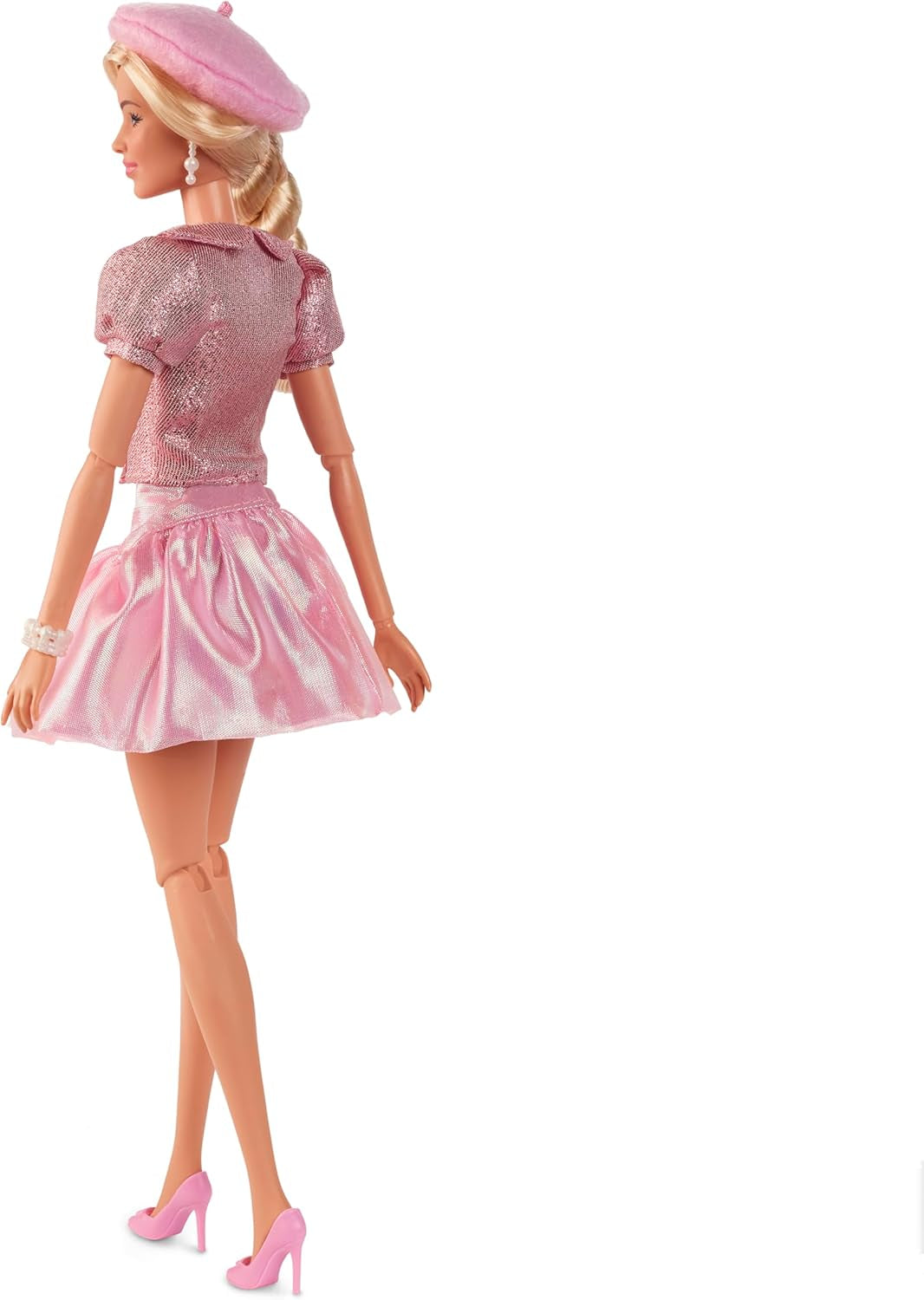 Barbie La película basada en la película Margot Robbie como figura coleccionable de Barbie con blusa rosa y falda de tul con peinado estilizado y joyas a juego JBJ53