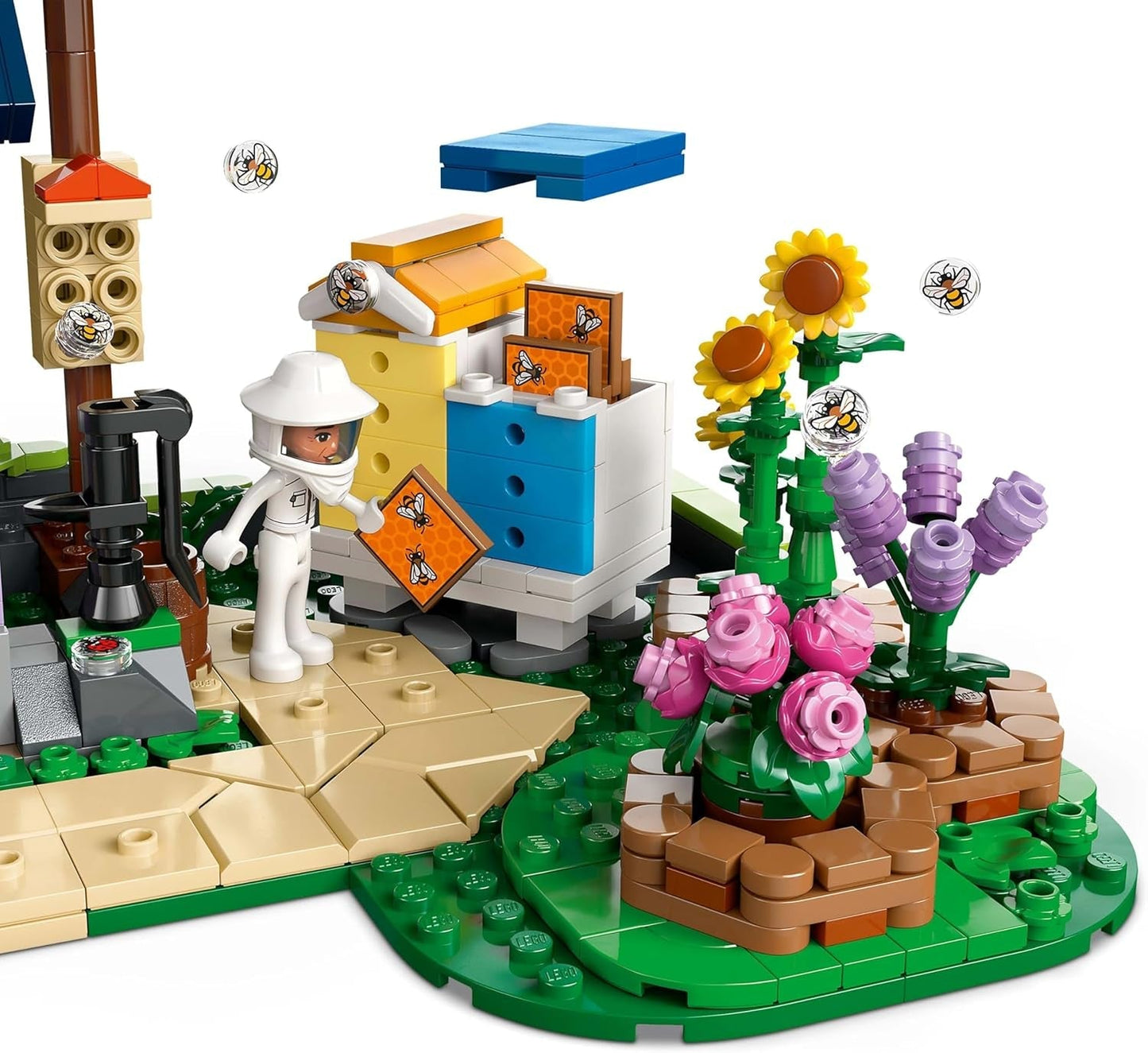 LEGO Friends Casa y jardín de flores Set de construcción El Apicultor Set de juego natural Regalo para niñas mayores de 12 años Set de modelos para construir 4 minifiguras y figuras de animales Gato y conejo 42669 Juegos de construcción Besuche den LEGO-Store