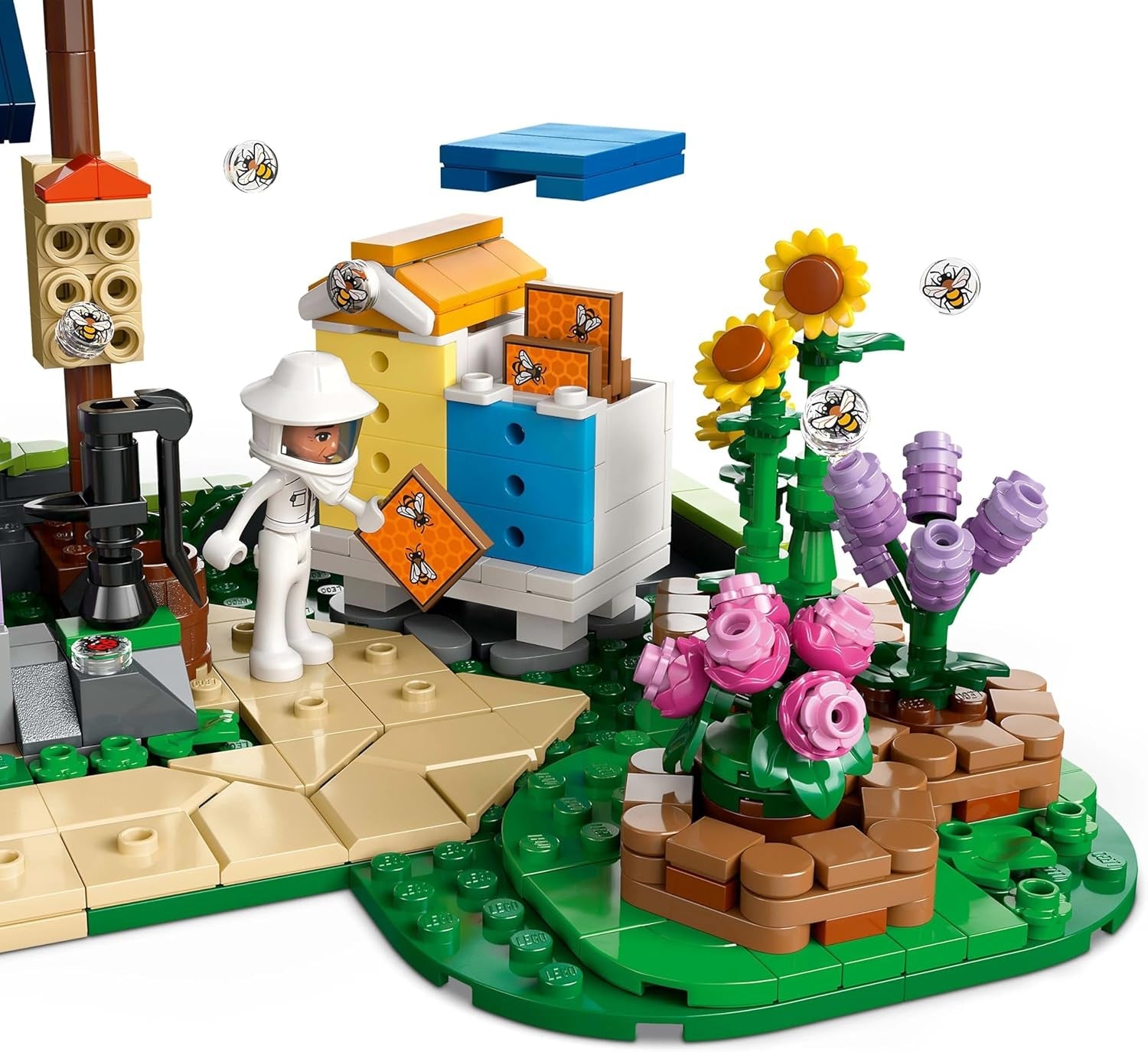 LEGO Friends Casa y jardín de flores Set de construcción El Apicultor Set de juego natural Regalo para niñas mayores de 12 años Set de modelos para construir 4 minifiguras y figuras de animales Gato y conejo 42669 Juegos de construcción Besuche den LEGO-Store