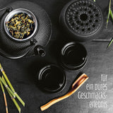 Juego de té Lumaland de 8 piezas | Tetera de hierro fundido Tetsubin de 1,4 litros | Calentador de hierro fundido | 2 tazas de té y 2 platillos | Juego de té japonés que incluye cuchara medidora de bambú e infusor de acero inoxidable.
