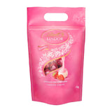 Bolas de chocolate extra oscuro Lindt LINDOR y bolas de chocolate con crema de fresa LINDOR | Bolsa resellable de 1 kg | aprox. 80 bolitas de chocolate blanco con crema de fresa