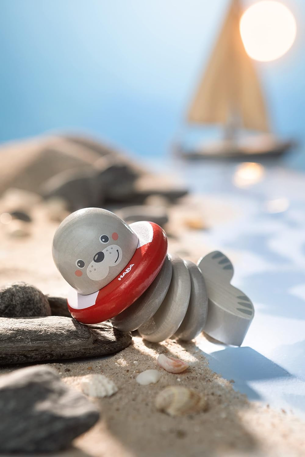 HABA 306691 - Sonajero Figura Foca, juguete para agarrar a partir de 6 meses, Made in Germany, gris Juguetes Bebé Naty Shop