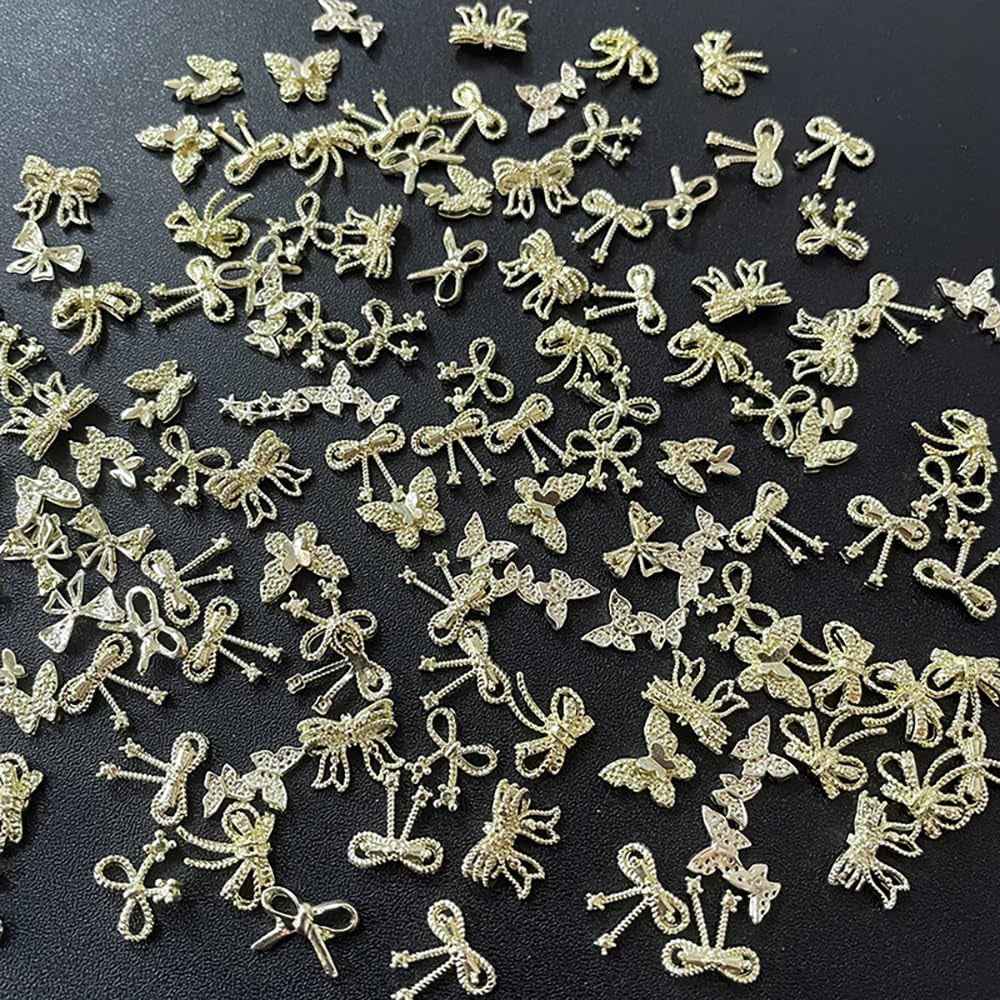 50Stück 3D Lazo Dorado Nail Charms Mariposa Nail Art Charms Legierung Bogen Nagel Charms Nägel Zubehör Schleife Nagelschmuck Metall Schleifen Schmetterling Nageldesign Nagelanhänger Nailart Strasssteine