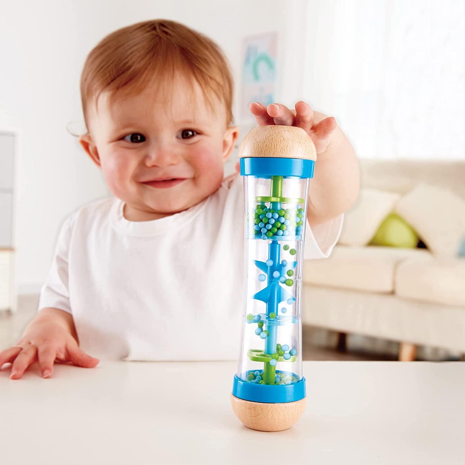 Hape hacedor de lluvia | mini juguete musical con cascabeles de madera, azul Juguetes Bebe Naty Shop