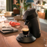 PHILIPS Original Plus Eco cafetera espresso de cápsulas, selección de intensidad de café, tecnología Coffee Boost, 80% plástico reciclado*, consumo energético reducido un 45%**, 2 tazas simultáneamente, negro piano (CSA210/22)