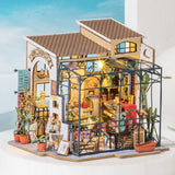 Robotime DG145 Rolife Emily's Flower Shop Casa de Muñecas en Miniatura Fabricada en madera, metal, tela y cartón, Dimensiones: 22 X 15 X 17 Cm, Naty Shop casas de muñecas