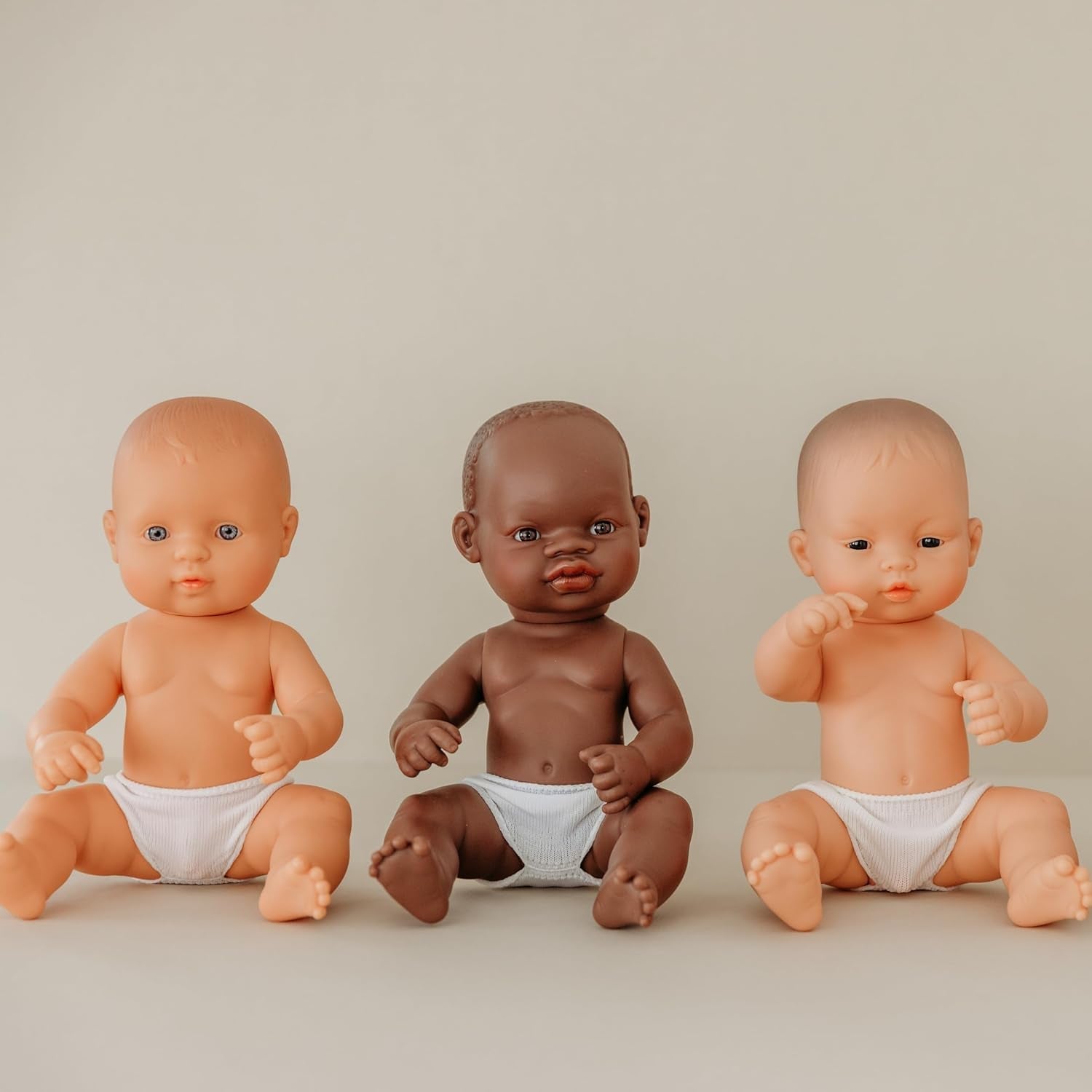 Muñeco Miniland Baby, niño africano, 32 cm, anatómicamente correcto