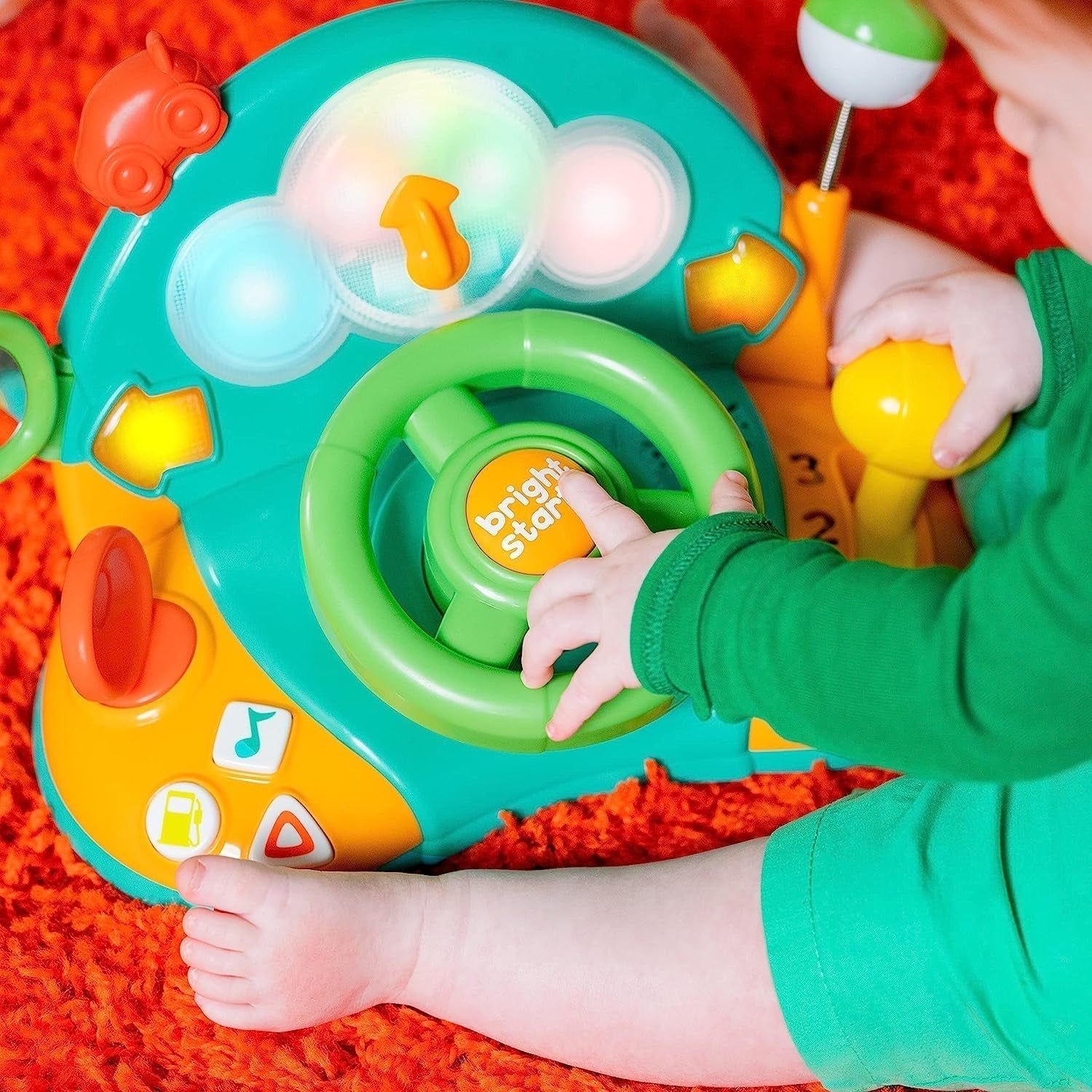 Bright Starts, volante de juguete, Lights & Colors Driver, con música, ruidos de auto, intermitentes, palanca de cambios y más Bebe Naty Shop Toys