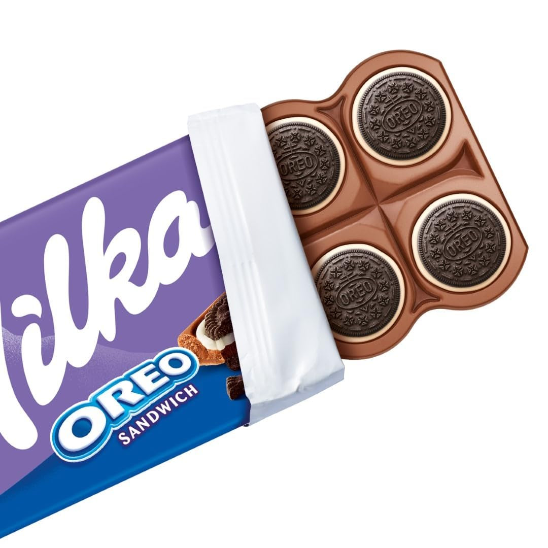 Sándwich Milka Oreo – Chocolate con leche alpino, relleno de crujientes trozos de galletas Oreo y suave crema de vainilla – 92g