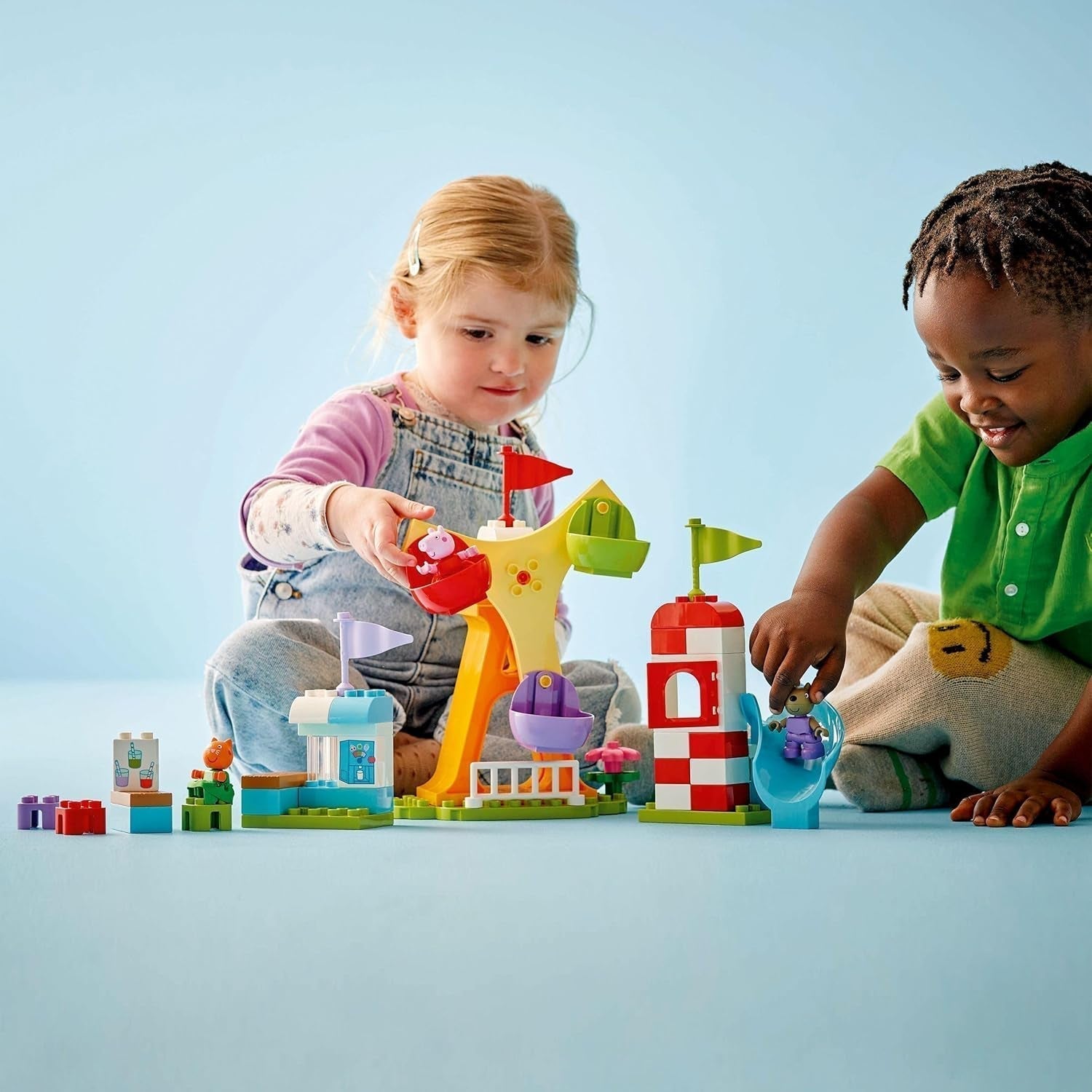 LEGO DUPLO Peppa Wutz Fairground - Juguetes infantiles y juguetes de motricidad para mayores de 2 años - Juegos preescolares con noria grande, tobogán y 3 figuras, incluidas Mollie Kitty y Klausi Kläff - Regalo para niños 10453 Juegos de construcción Besuche den LEGO-Store