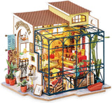 Robotime DG145 Rolife Emily's Flower Shop Casa de Muñecas en Miniatura Fabricada en madera, metal, tela y cartón, Dimensiones: 22 X 15 X 17 Cm, Casas de Muñecas Naty Shop Título predeterminado