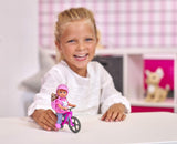 Simba 105733273 - Evi Love Fun Holiday Bike Doll con bicicleta, perro y mochila, Fashion Doll, 12 cm, para niños a partir de 3 años