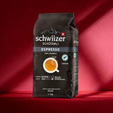 Schwiizer Schüümli Espresso, café en grano 100% Arábica, fuerte e intenso, ideal para cafeteras espresso automáticas, concentración 4/5, tueste medio, Rainforest Alliance, 1kg