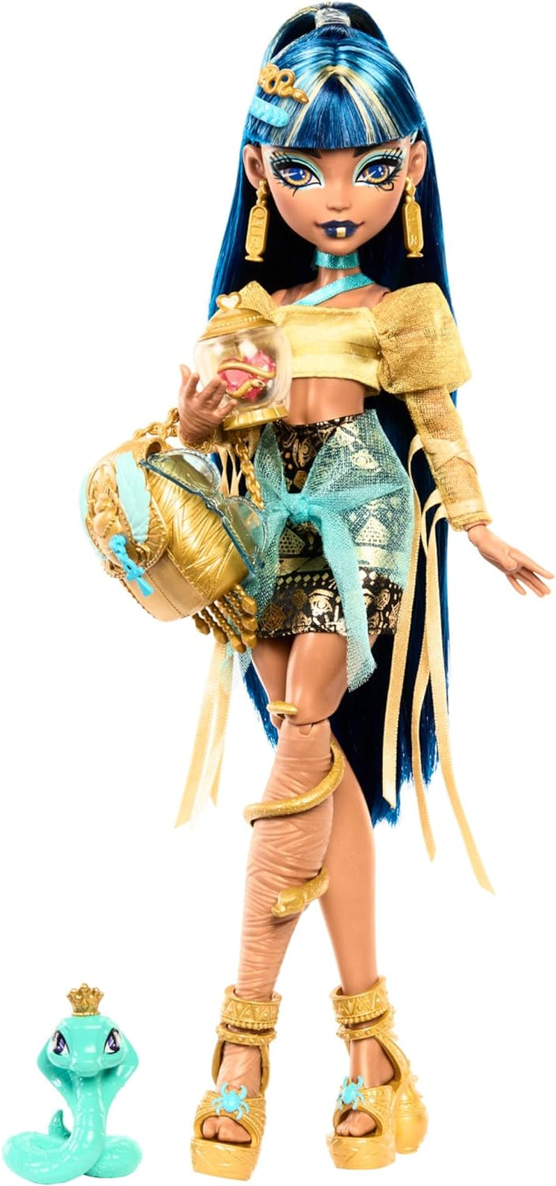 Muñeca Monster High Cleo De Nile con blusa dorada y falda a capas, incluye la cobra Hissette y accesorios como una mochila, un refrigerio y un rollo de papel higiénico, HXH74