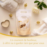 LINDOR bolitas de chocolate blanco, 1 kg y LINDOR | Bolsa resellable de 1 kg | aprox. 80 bolitas de chocolate con leche con relleno de menta | Paquete a granel, regalo de praliné, regalo de chocolate.