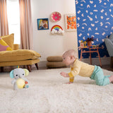 Bright Starts, Elefante bebé Hug-a-bye con luces, canciones, diferentes texturas y más, multicolor Juguetes Bebe Naty Shop