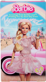 Barbie La película basada en la película Margot Robbie como figura coleccionable de Barbie con blusa rosa y falda de tul con peinado estilizado y joyas a juego JBJ53
