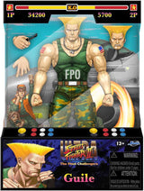 Jada Toys Figura de Street Fighter Guile (15 cm) - Street Fighter 2: The Final Challengers Figura de acción móvil coleccionable con cabeza, manos y accesorios alternativos, figuras de acción para mayores de 13 años Naty Shop