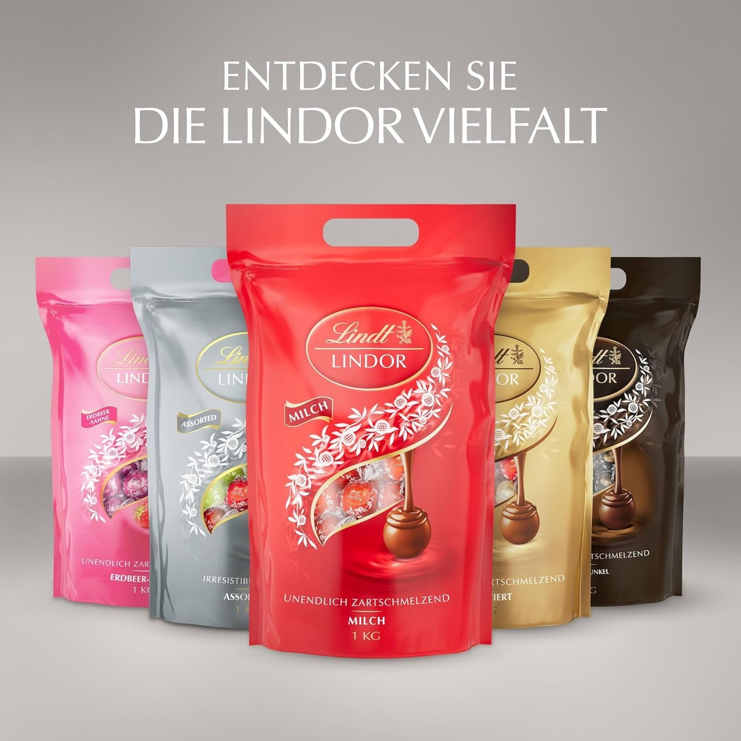 Chocolate Lindt | Bolso surtido LINDOR plata | Bolsa de 1kg | 80 bolitas de chocolate con leche que se deshacen en la boca, 70%, sabores de caramelo salado y doble chocolate | Regalo de chocolate para compartir
