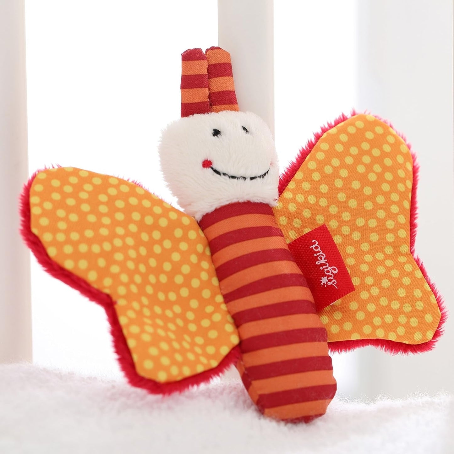 41174 Cascabel Estrellas Rojas juguete para bebé niña y niño recomendado desde el nacimiento marrón & 41181 Juguete atrapamariposas Juguete para bebé niña y niño Estrellas Rojas recomendado desde el nacimiento naranja Bebe Naty Shop Juguetes
