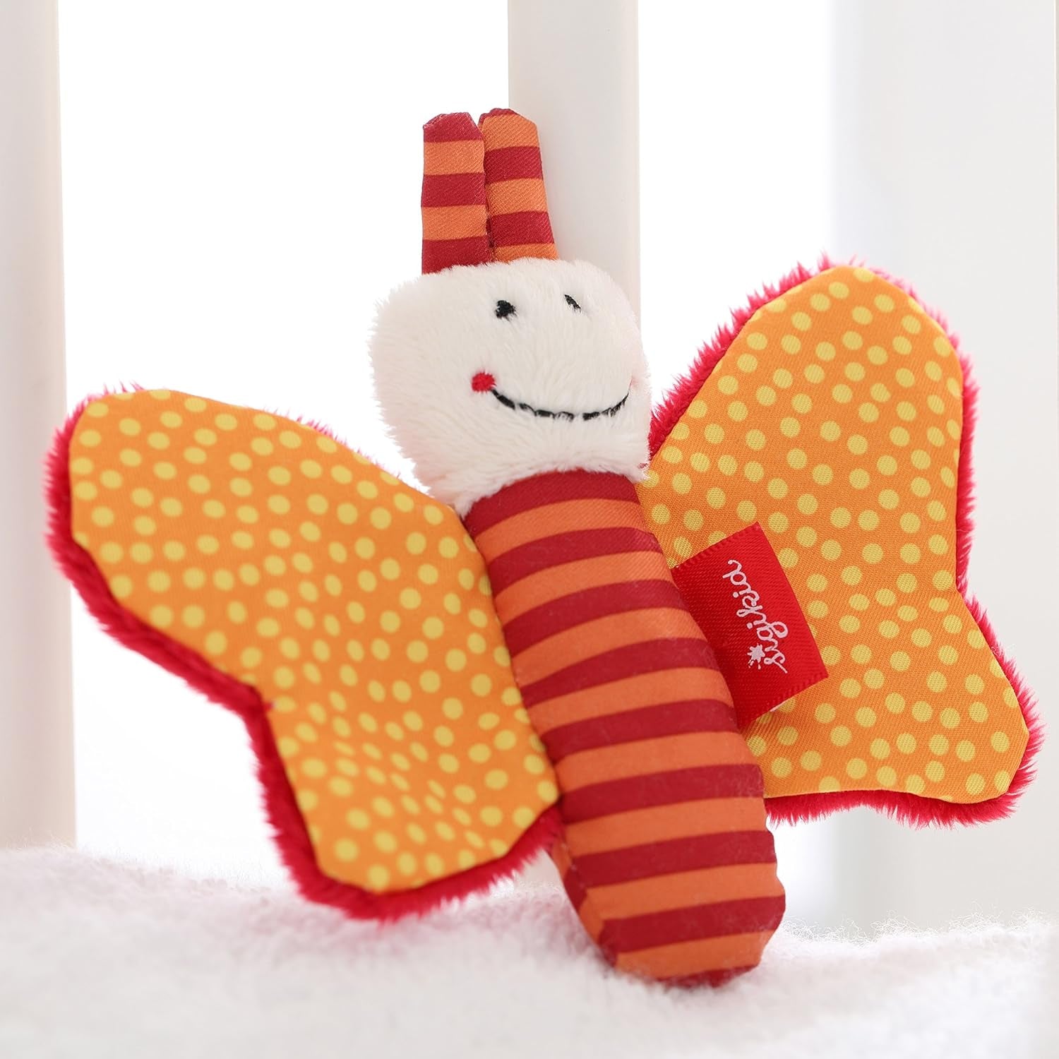 41174 Cascabel Estrellas Rojas juguete para bebé niña y niño recomendado desde el nacimiento marrón & 41181 Juguete atrapamariposas Juguete para bebé niña y niño Estrellas Rojas recomendado desde el nacimiento naranja Bebe Naty Shop Juguetes