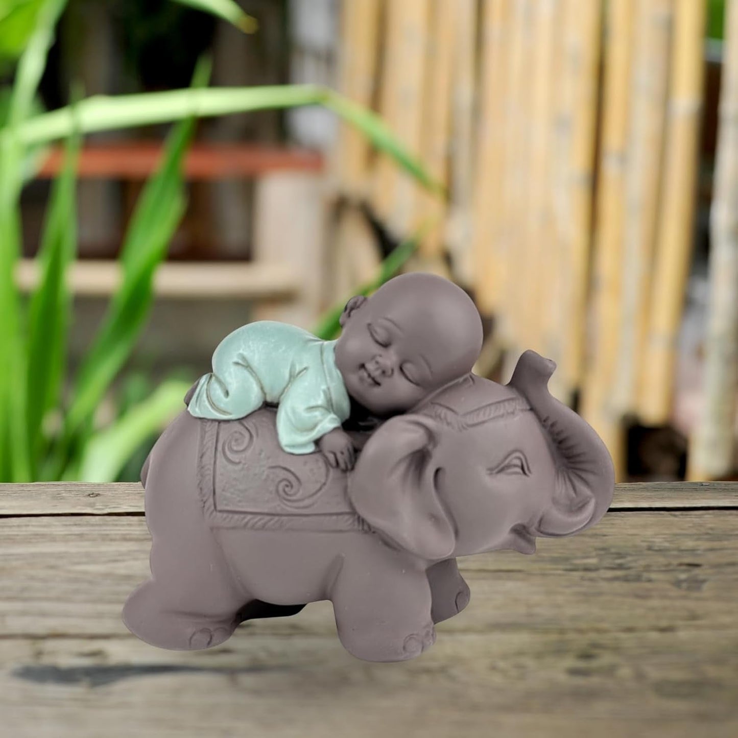 Zen'Light Estatua Bonzo de Buda durmiendo sobre un elefante - Atmósfera zen en tu espacio sagrado - Hermosa figura auspiciosa -Al. 9,5 cm, marrón y verde Estatuillas y esculturas Naty Shop